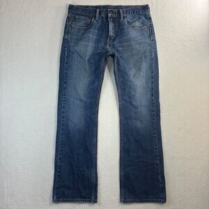 Levis 527 Slim Bootcut Jeans Mens 34x33 Blue Whiskered Distressed Faded Western